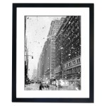 Bits of paper rain down on the street in Manhattan as rumours of Japan's surrender surface, 1945 Framed Print