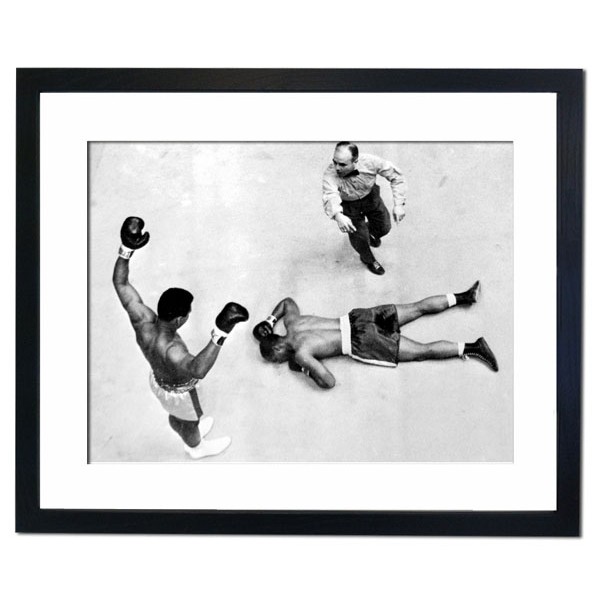 Champion Cassius Clay stands over challenger Zora Folley, Madison Square Garden, New York 1967 Framed Print