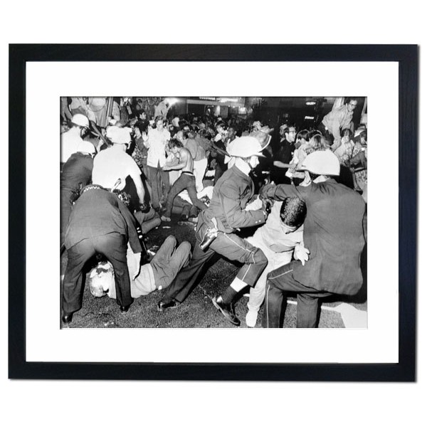 Chicago Police and Anti Vietnam War demonstrators mix it up on Michigan Avenue, 1968 Framed Print