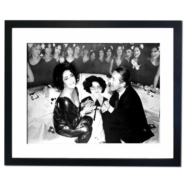 Elizabeth Taylor celebrating 46th Birthday at Studio 54, New York Framed Print