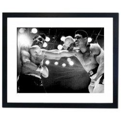 Floyd Patterson & Cassius Clay exchange blows, Las Vegas, 1965 Framed Print