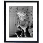 Marilyn Monroe getting ready, 1955 Framed Print