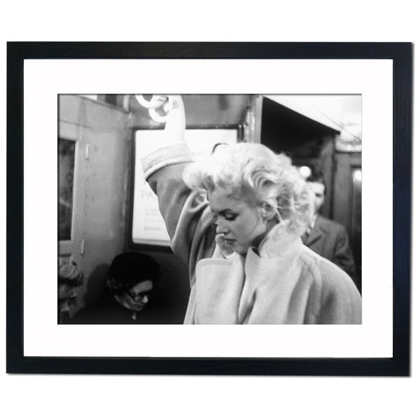Marilyn Monroe on the train, 1955 Framed Print