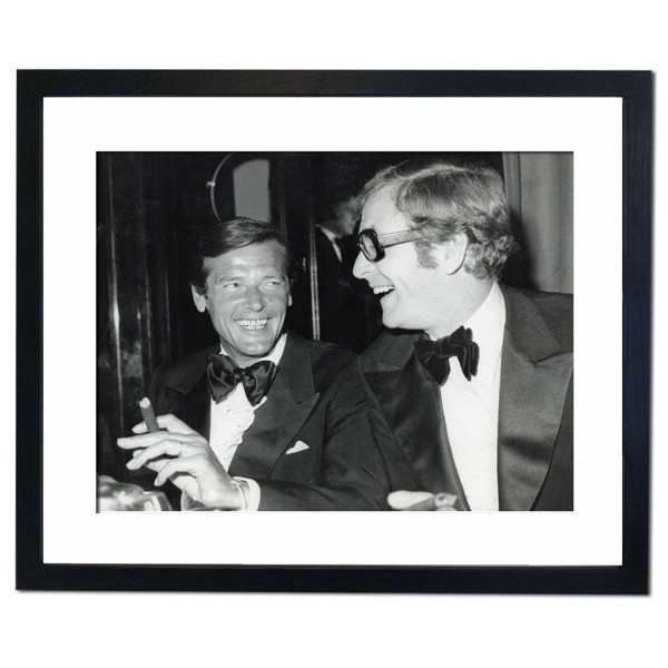 Michael Caine & Roger Moore, 1973 Framed Print