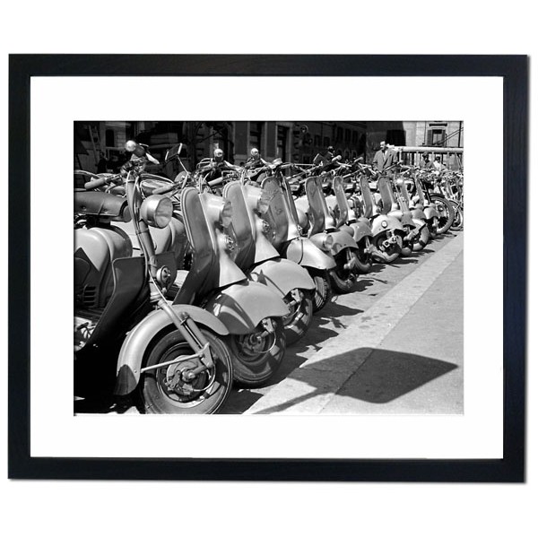 Scooters lined up in the streets of Italy Framed Print